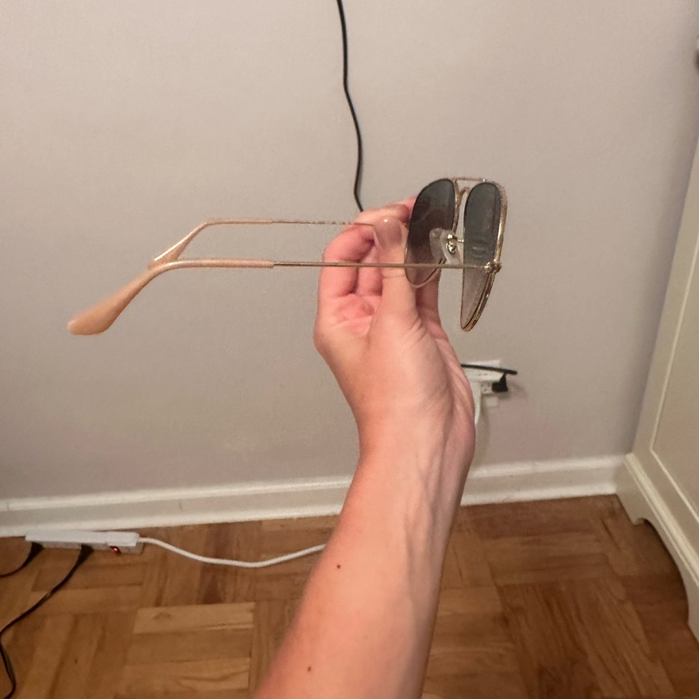 Gold framed blue lens rayban sunglasses